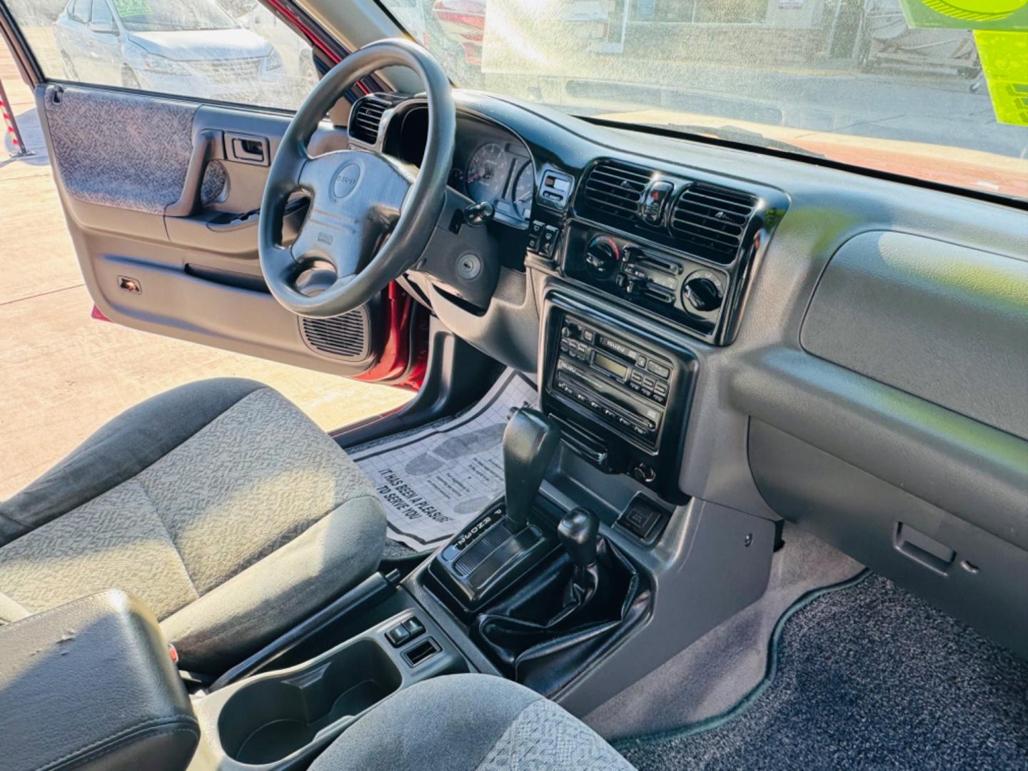 2000 Red Isuzu Rodeo LS , located at 2190 Hwy 95, Bullhead City, AZ, 86442, (928) 704-0060, 0.000000, 0.000000 - 2000 Isuzu rodeo LS. Automatic 4 wheel drive . Only 114k original miles v6. Brand new tires . Lots of upgrades . We finance - Photo#5